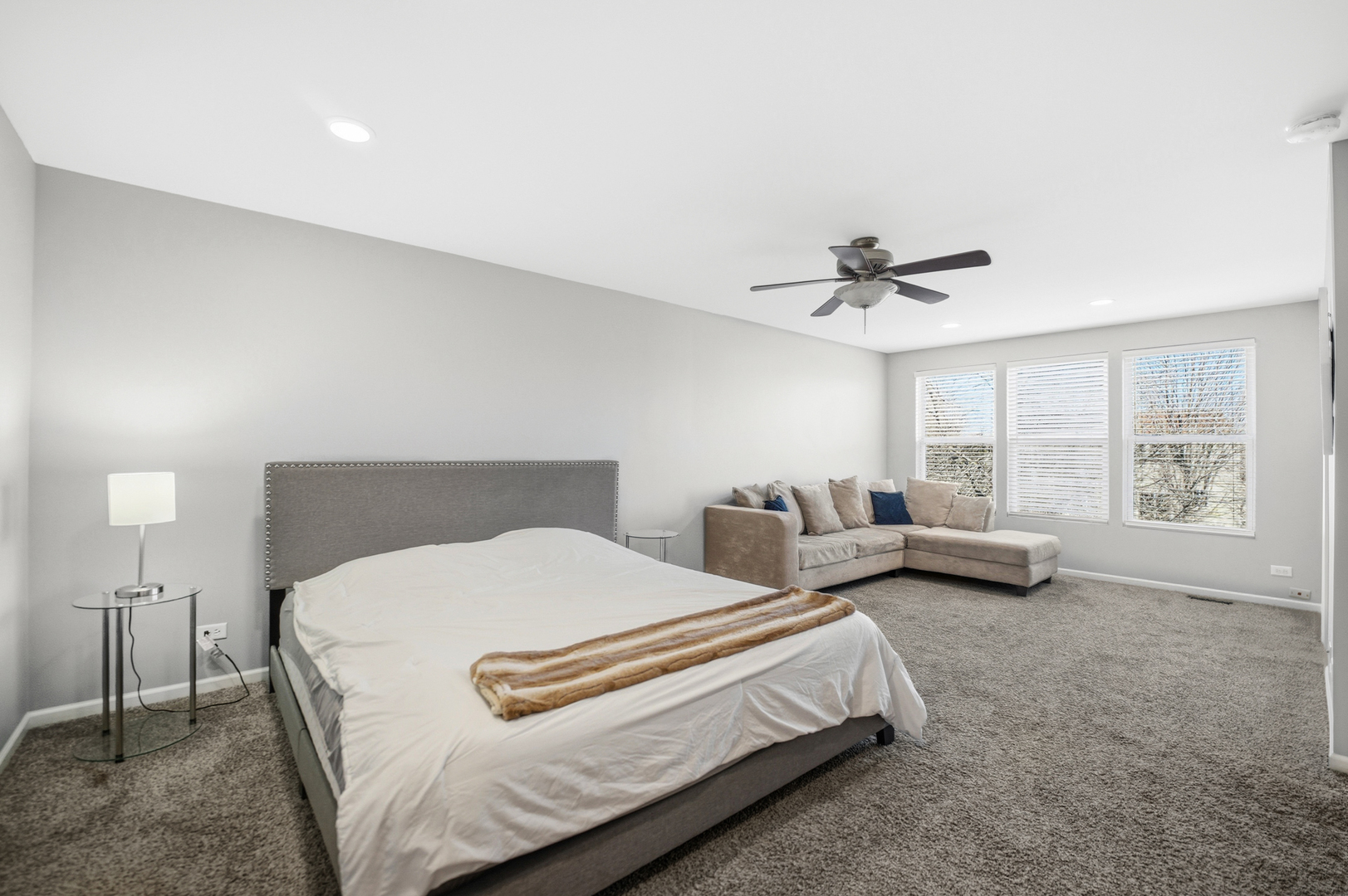 136 Lilac Street Bolingbrook, IL 60490 - Photo 11 of 30 a bedroom with bed and a large window