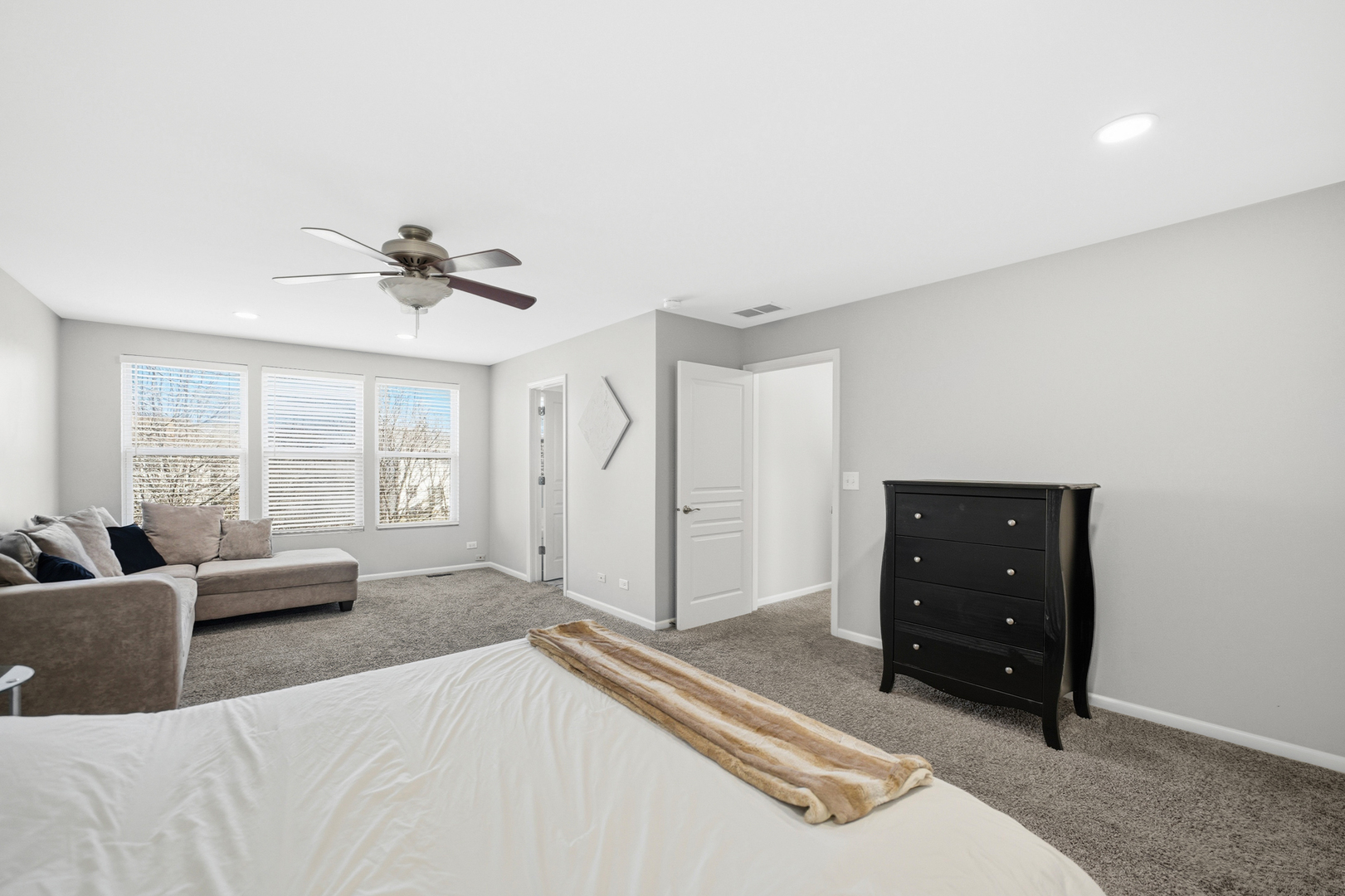 136 Lilac Street Bolingbrook, IL 60490 - Photo 12 of 30 a living room with furniture and a window