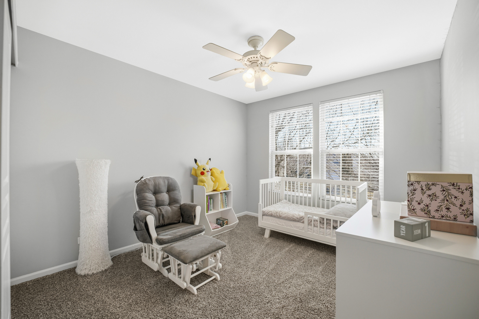 136 Lilac Street Bolingbrook, IL 60490 - Photo 16 of 30 a living room with furniture and a large window