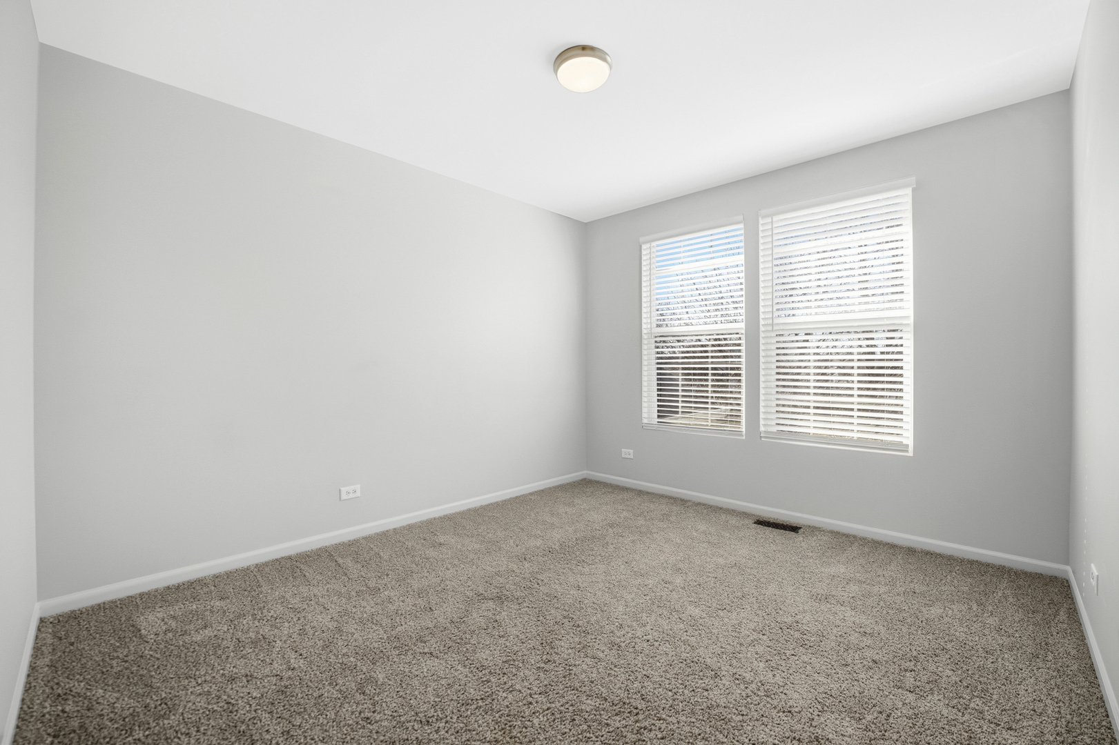 136 Lilac Street Bolingbrook, IL 60490 - Photo 18 of 30 an empty room with a window