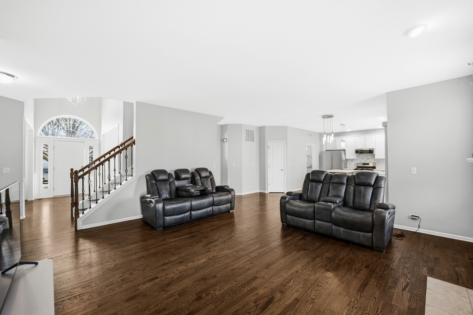 136 Lilac Street Bolingbrook, IL 60490 - Photo 6 of 30 a living room with furniture and a wooden floor