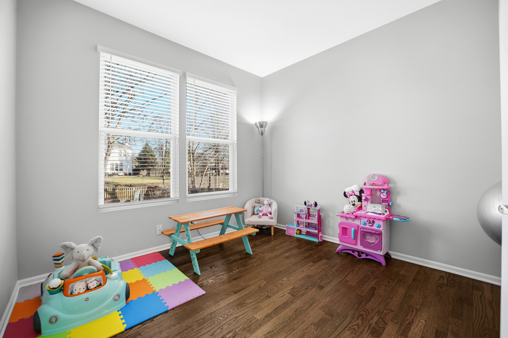 136 Lilac Street Bolingbrook, IL 60490 - Photo 8 of 30 a bedroom with toys and a wooden floor