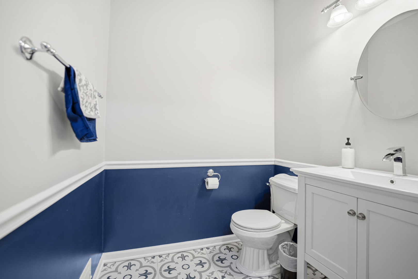 136 Lilac Street Bolingbrook, IL 60490 - Photo 10 of 30 a bathroom with a sink a toilet and a mirror