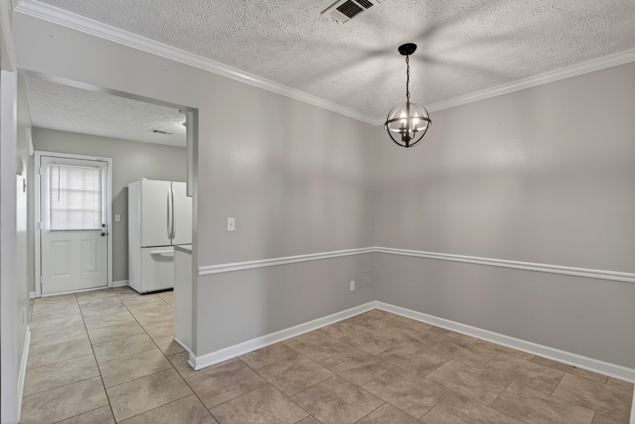 430 Walton Ferry Road, Unit 200 Hendersonville, TN 37075 - Photo 6 of 16 a view of a room with wooden floor and cabinets