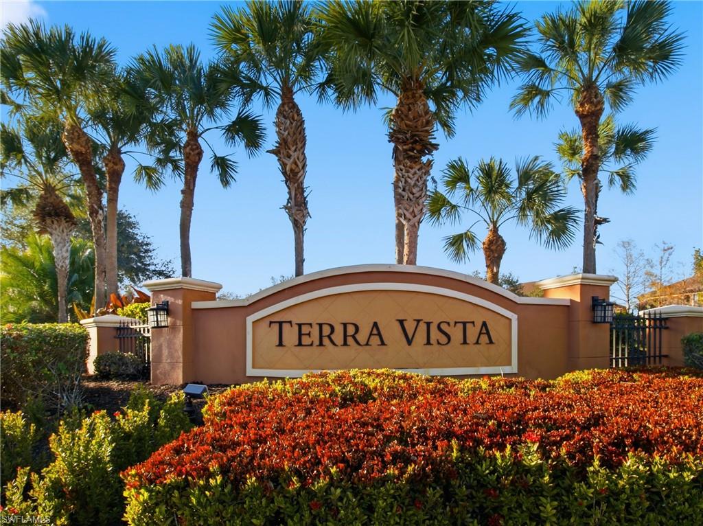 20161 Bravada Street, Unit 2 Estero, FL 33928 - Photo 33 of 33 a view of outdoor space with signage and flags