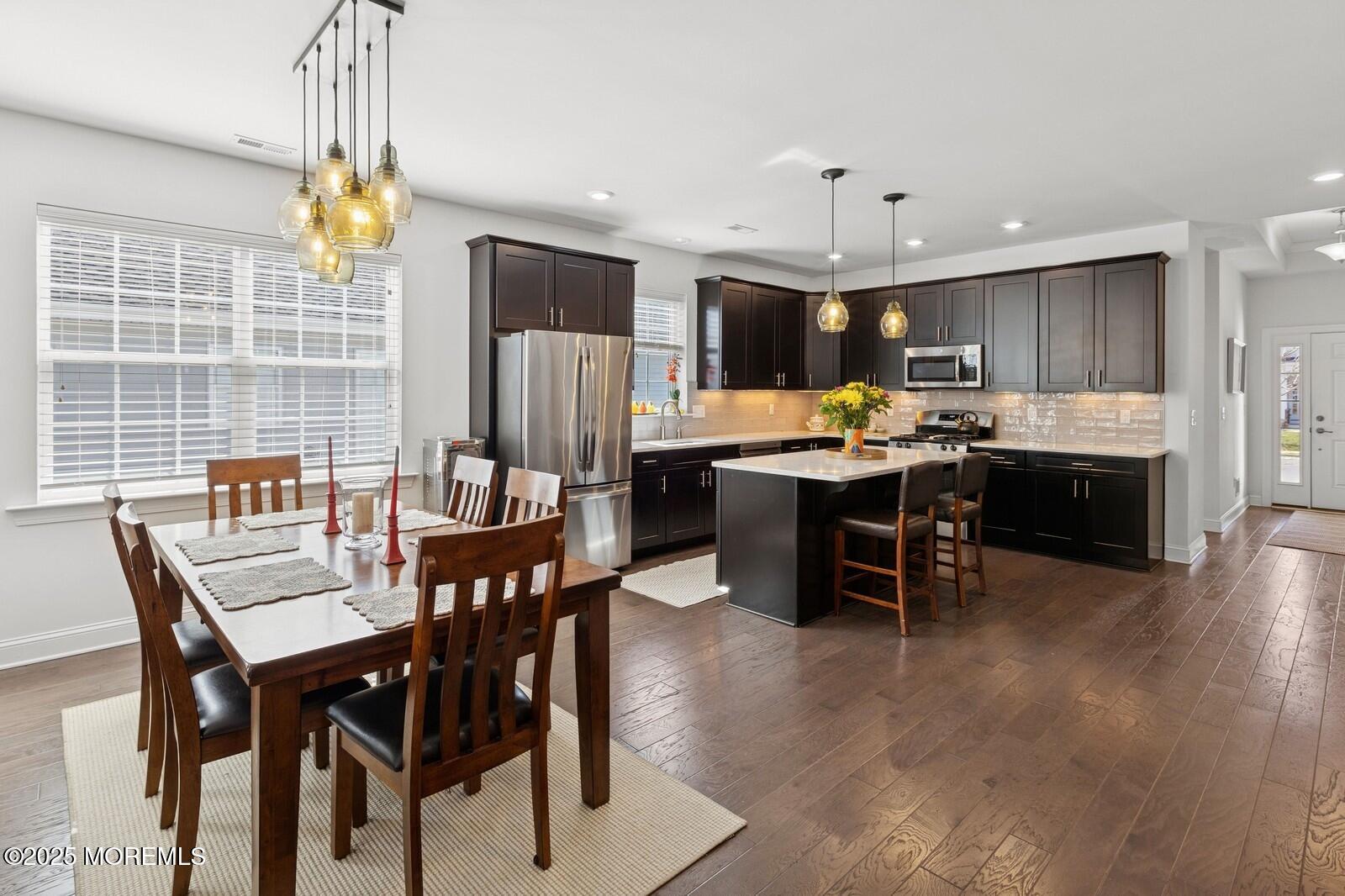 60 Butler Drive Barnegat, NJ 08005 - Photo 14 of 59 a view of a dining room with furniture window and wooden floor