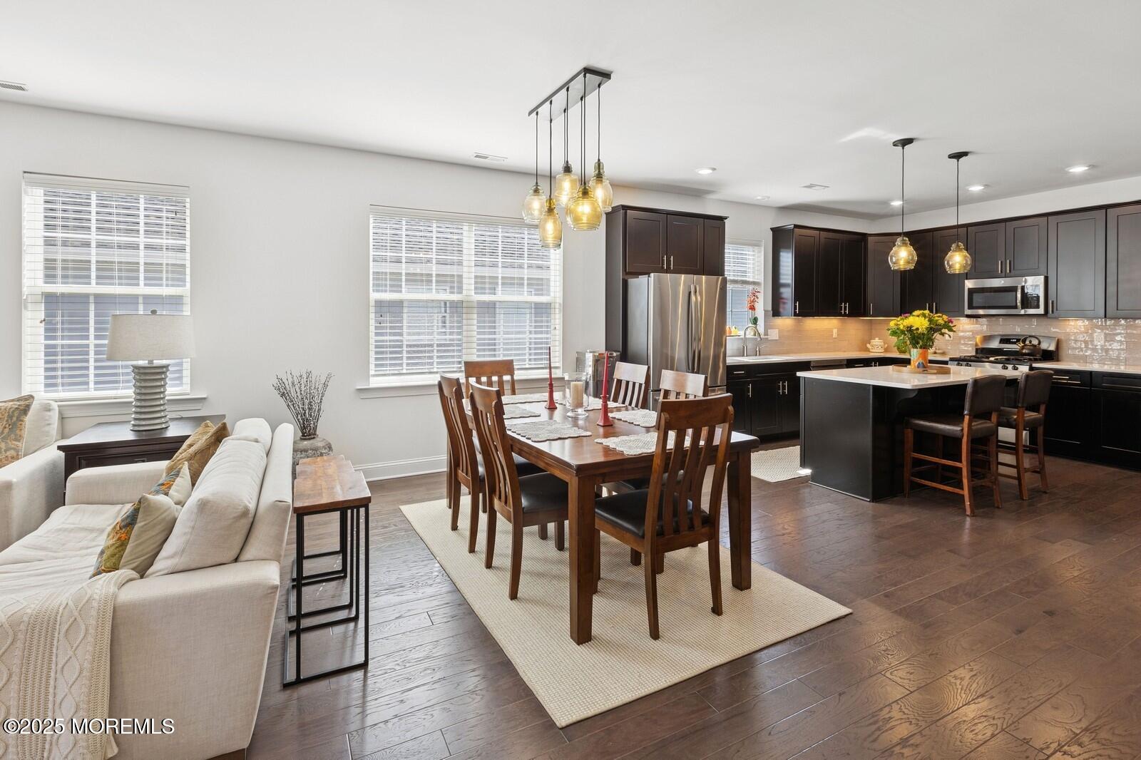 60 Butler Drive Barnegat, NJ 08005 - Photo 21 of 59 a view of a dining room with furniture window and wooden floor