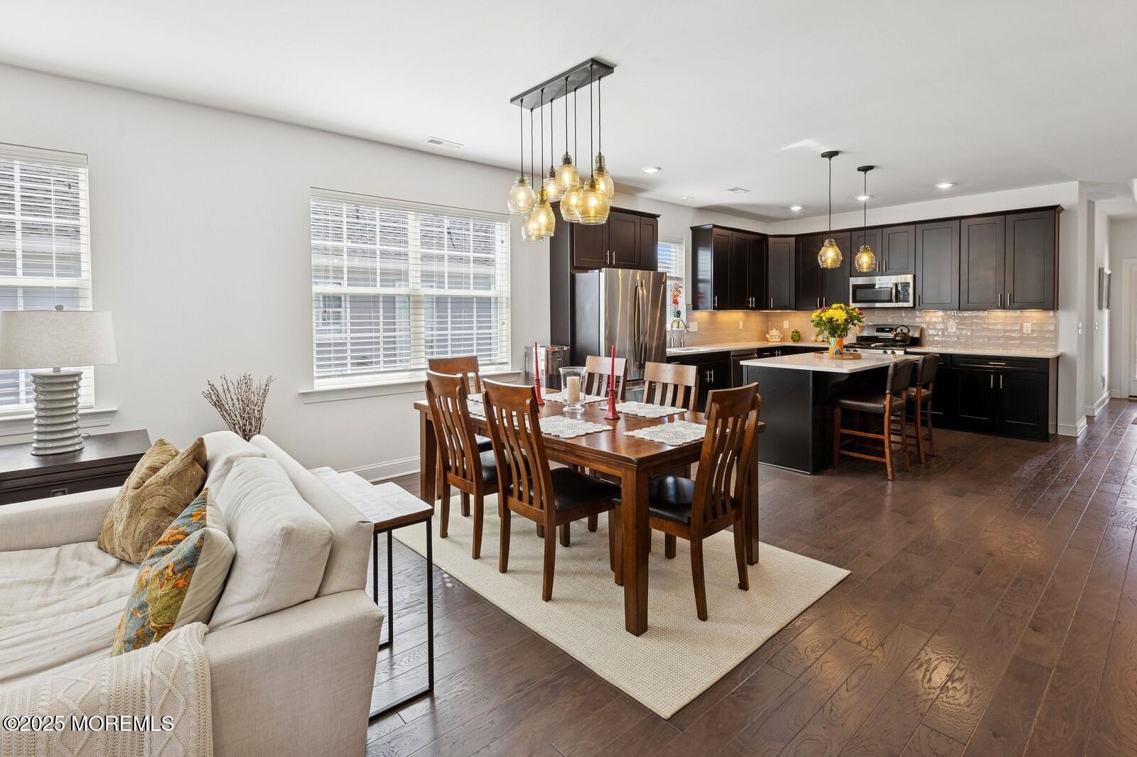 60 Butler Drive Barnegat, NJ 08005 - Photo 22 of 59 a view of a dining room with furniture window and wooden floor
