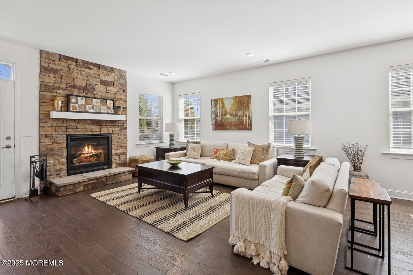 60 Butler Drive Barnegat, NJ 08005 - Photo 27 of 59 a living room with furniture and a fireplace