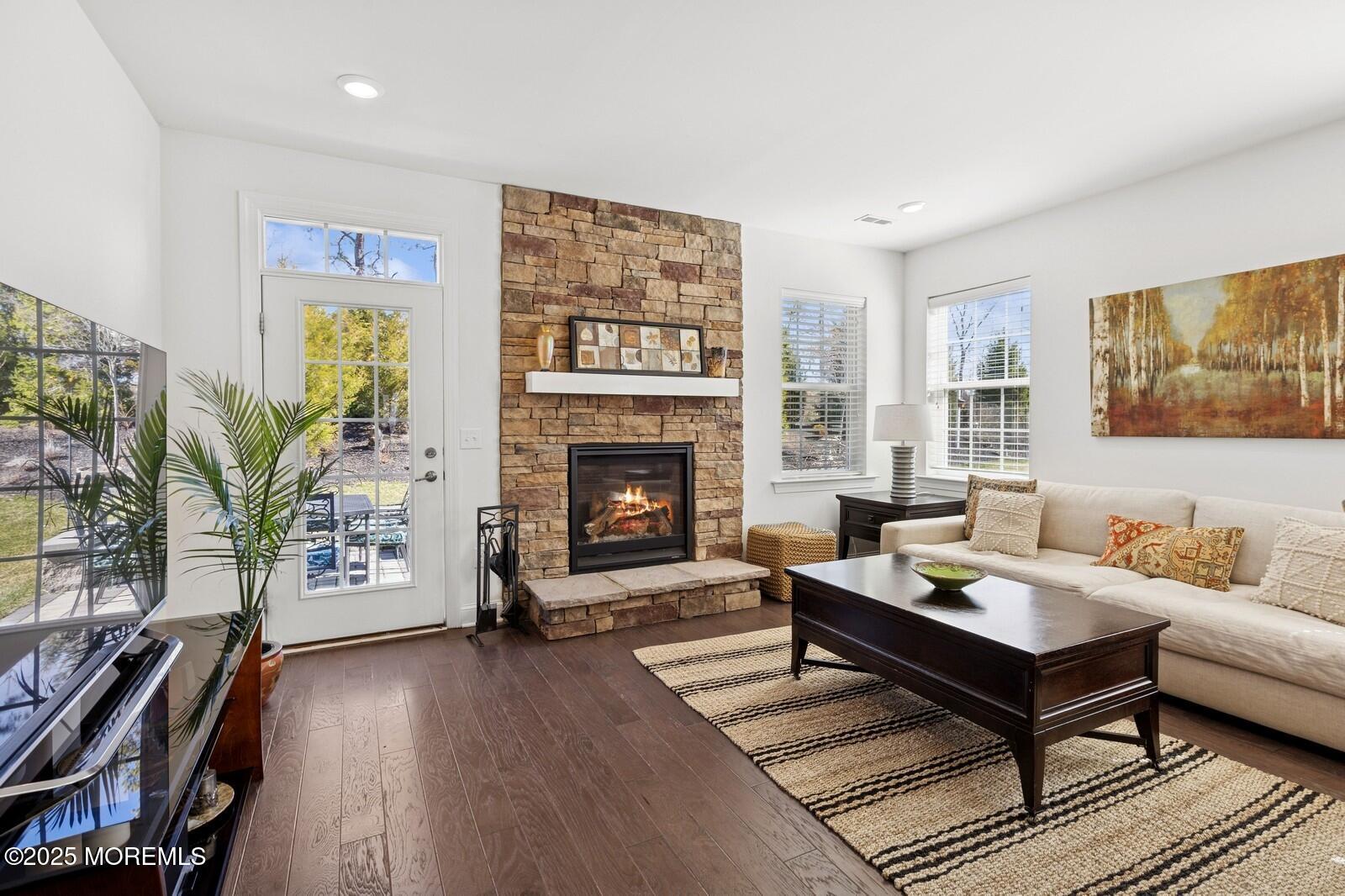 60 Butler Drive Barnegat, NJ 08005 - Photo 28 of 59 a living room with furniture and a fireplace