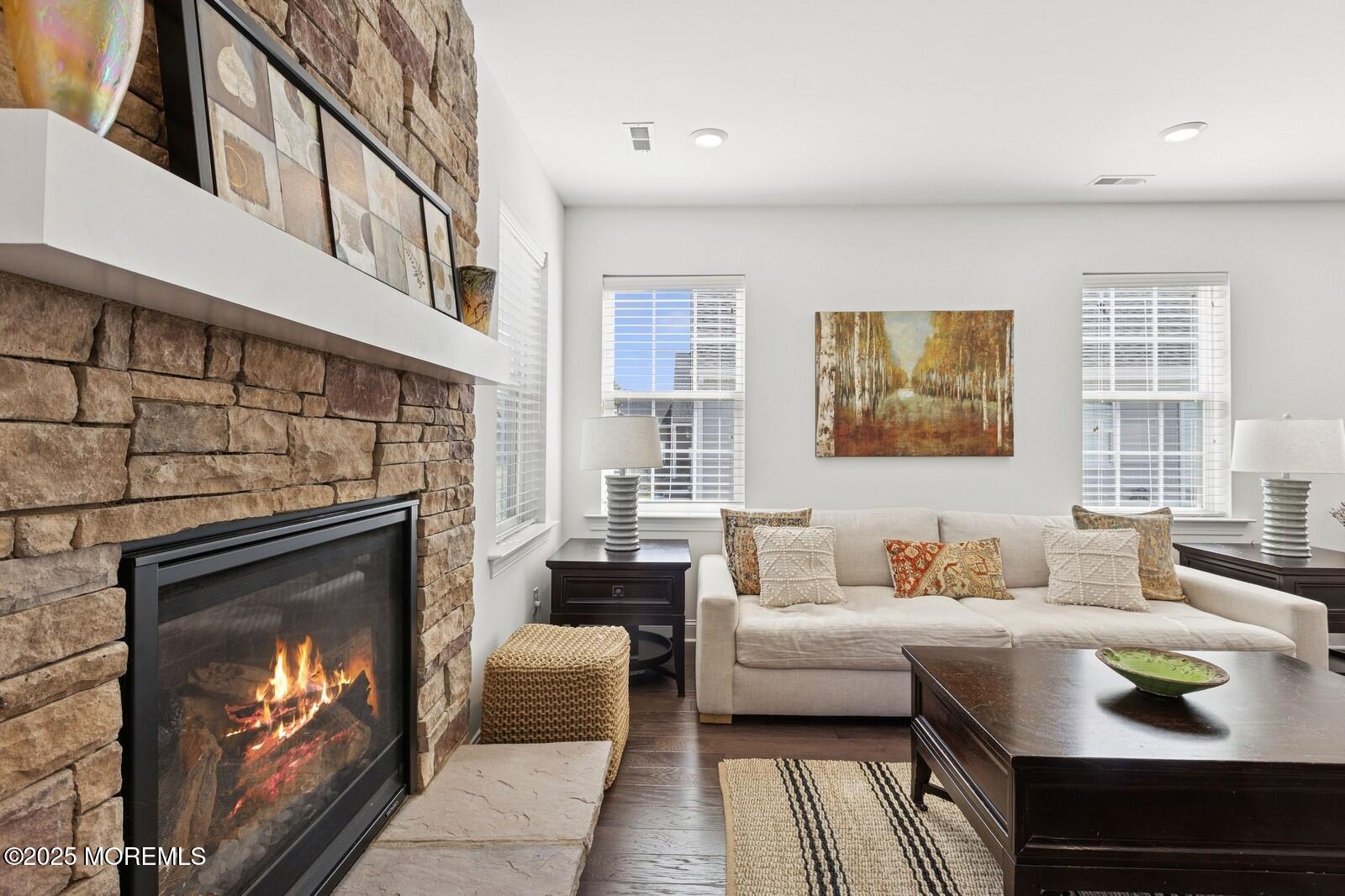 60 Butler Drive Barnegat, NJ 08005 - Photo 32 of 59 a living room with furniture and a fireplace