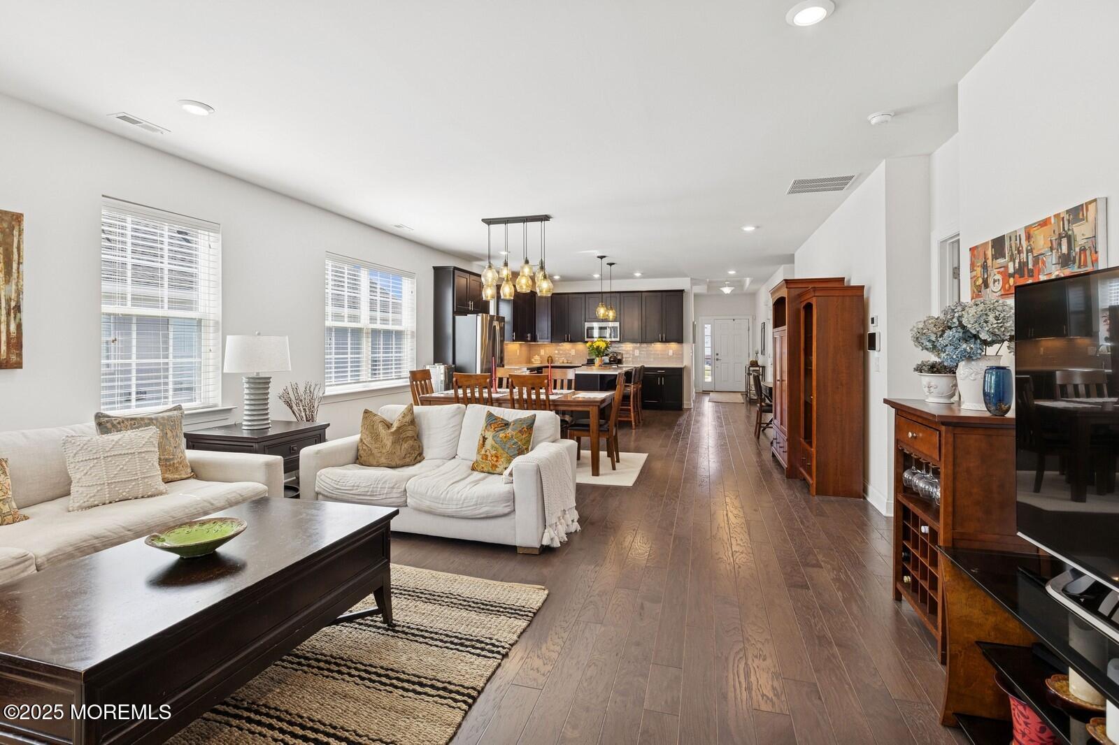 60 Butler Drive Barnegat, NJ 08005 - Photo 34 of 59 a living room with furniture and a flat screen tv