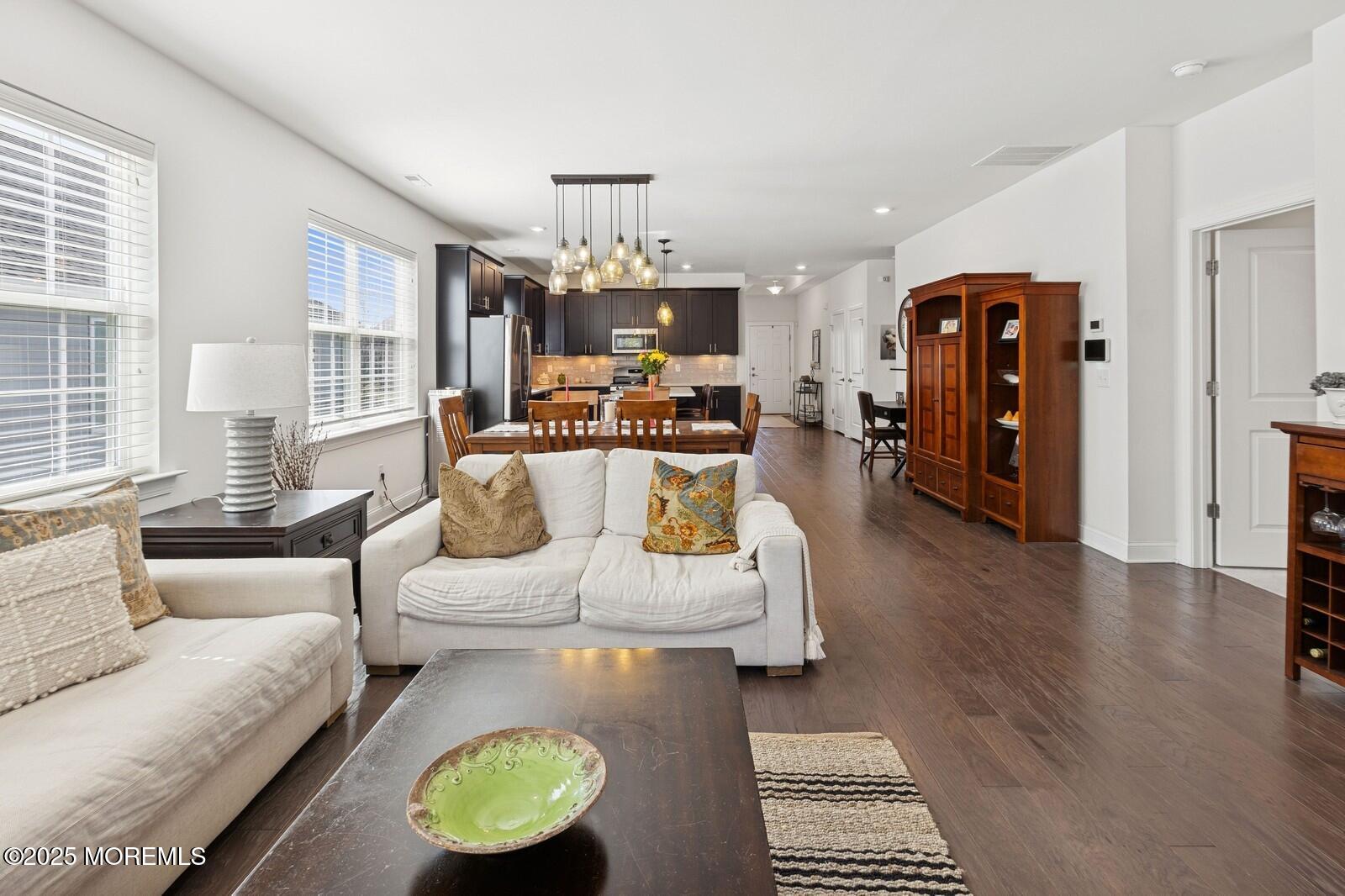 60 Butler Drive Barnegat, NJ 08005 - Photo 35 of 59 a living room with furniture and wooden floor