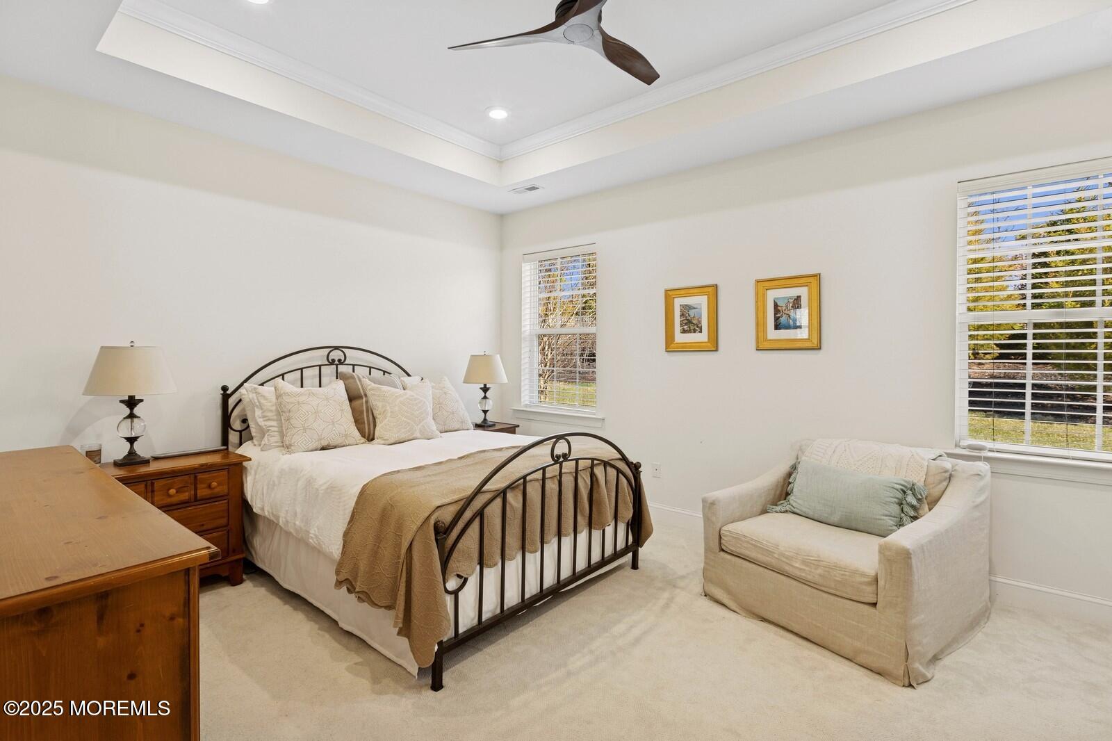 60 Butler Drive Barnegat, NJ 08005 - Photo 37 of 59 a spacious bedroom with a bed and a couch