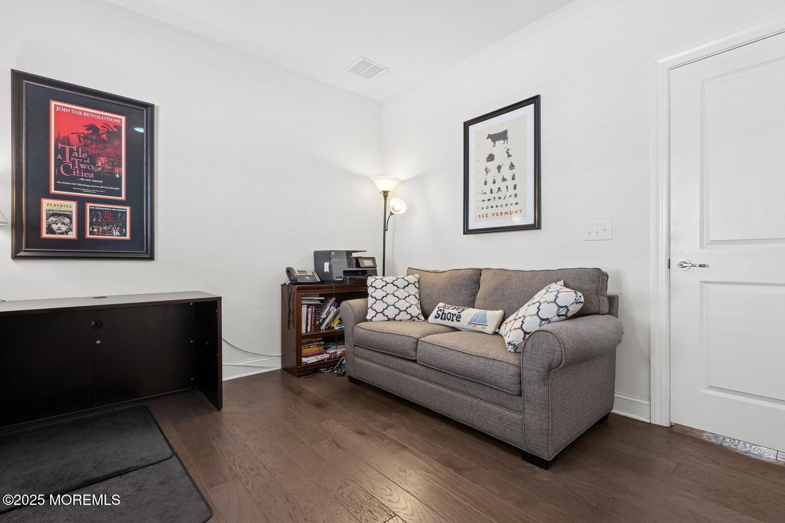 60 Butler Drive Barnegat, NJ 08005 - Photo 44 of 59 a living room with furniture and a couch