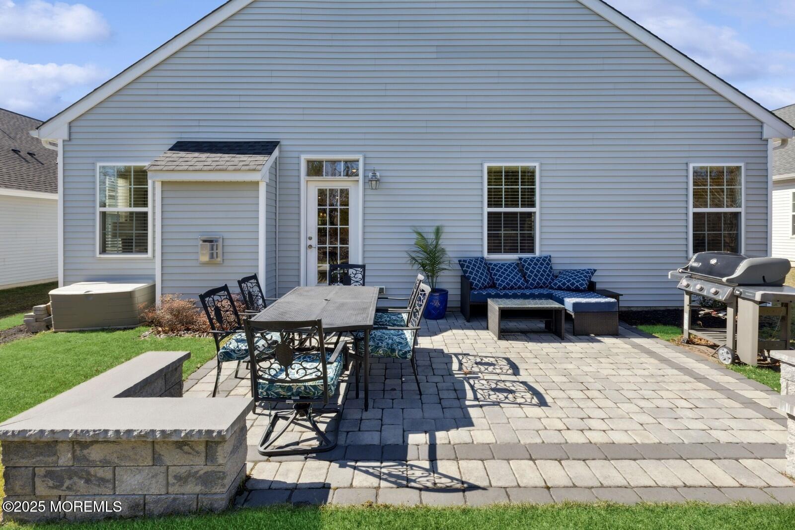 60 Butler Drive Barnegat, NJ 08005 - Photo 48 of 59 a view of a dinning table and chairs in the patio