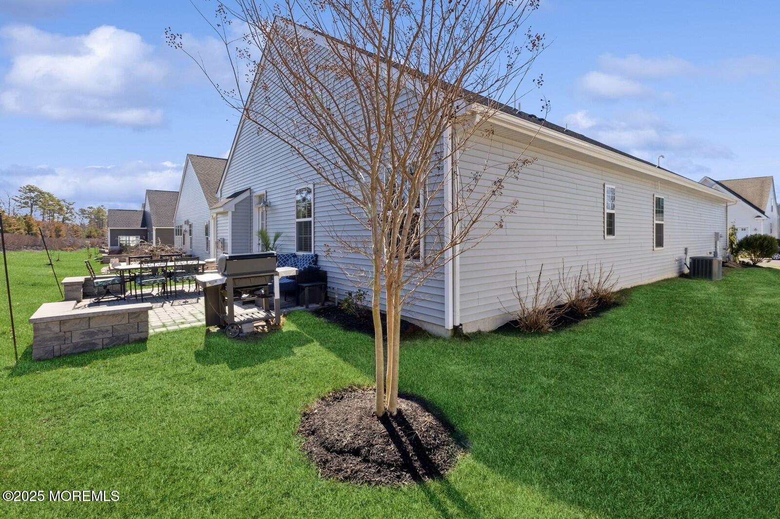 60 Butler Drive Barnegat, NJ 08005 - Photo 50 of 59 a house view with a sitting space and garden
