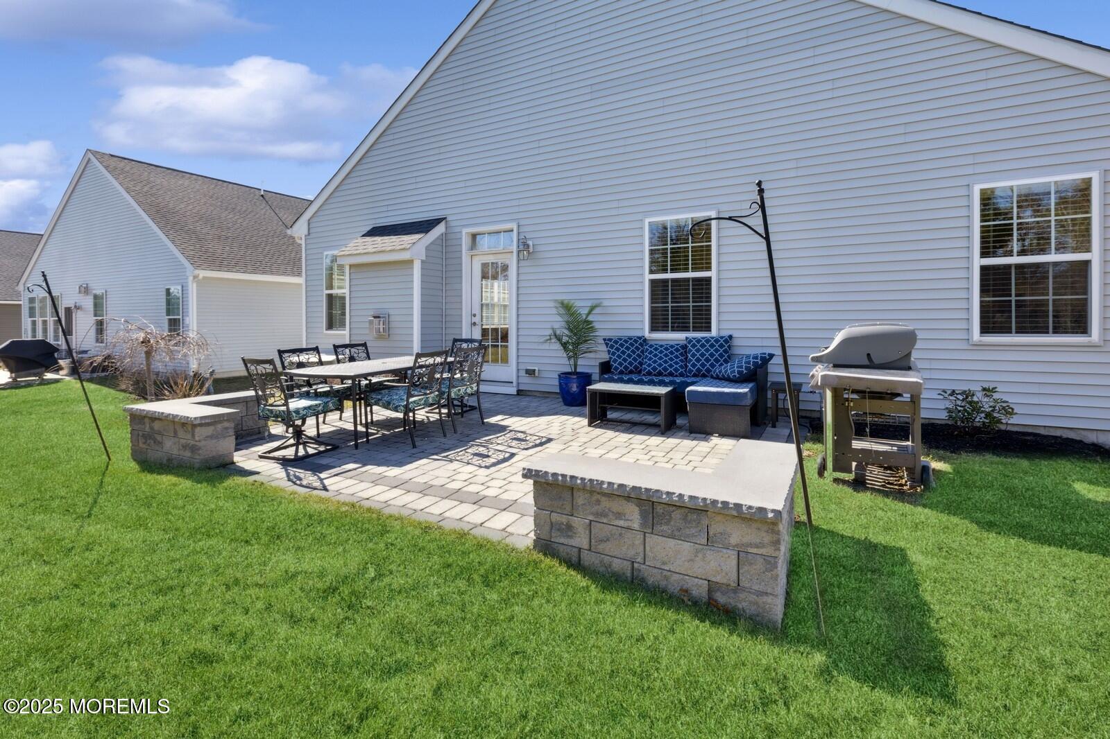 60 Butler Drive Barnegat, NJ 08005 - Photo 51 of 59 a view of a house with backyard and sitting area