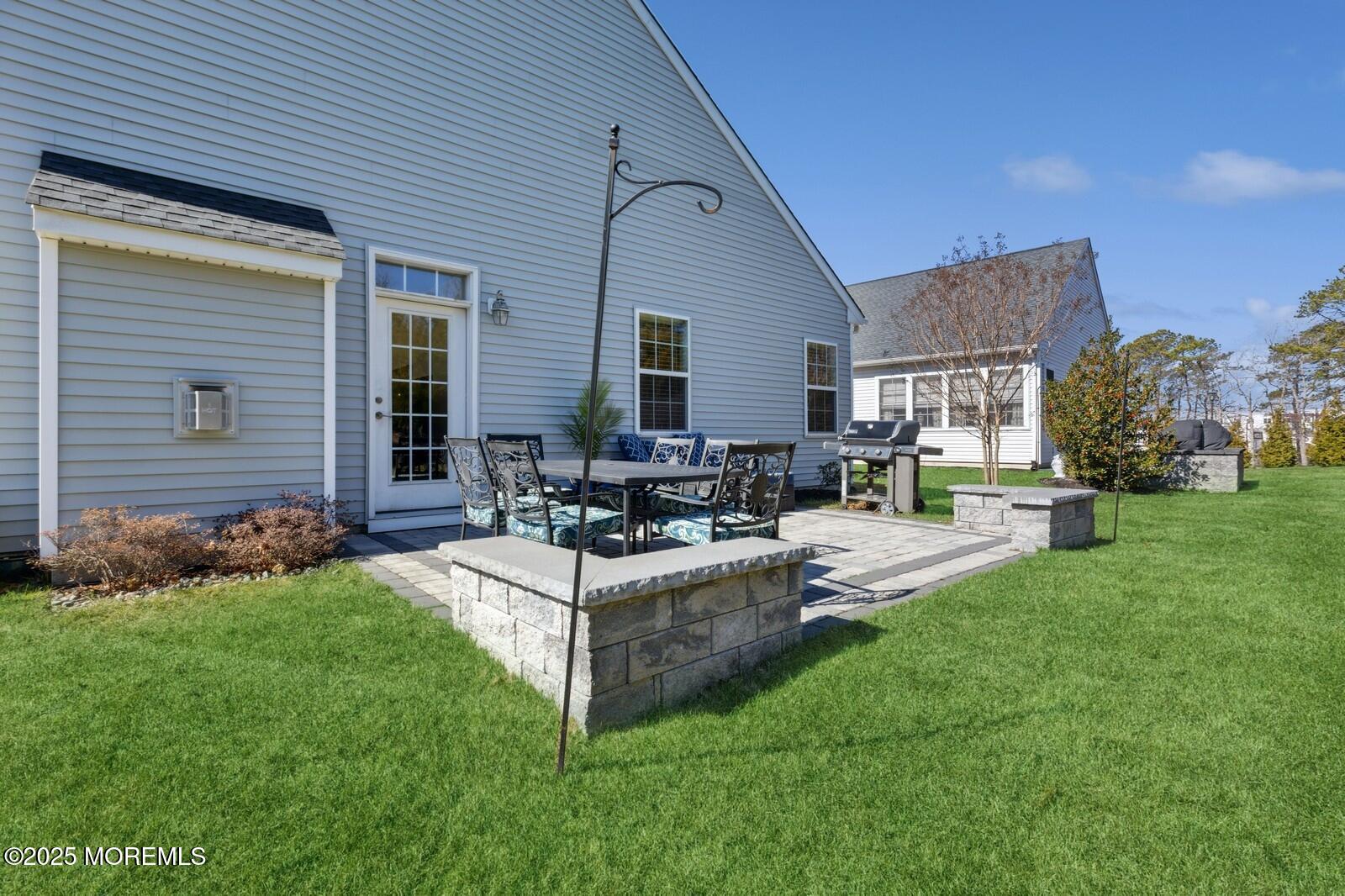 60 Butler Drive Barnegat, NJ 08005 - Photo 53 of 59 a view of a house with backyard and sitting area
