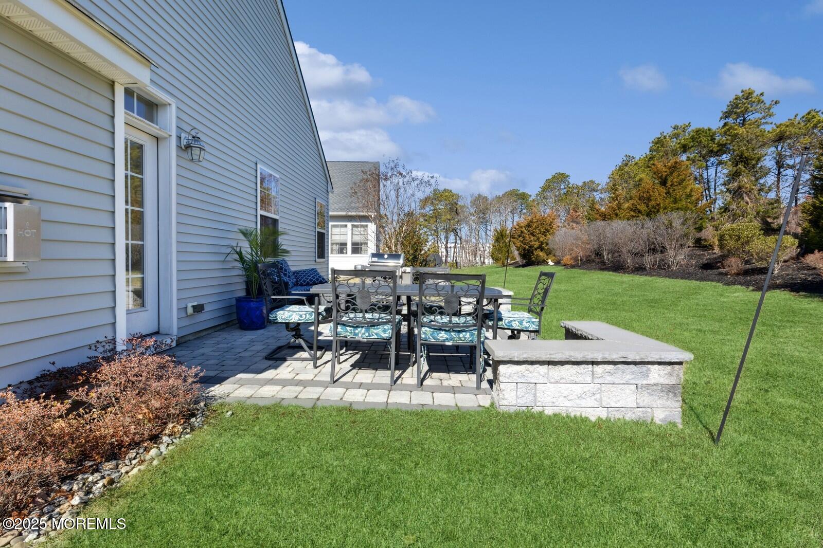 60 Butler Drive Barnegat, NJ 08005 - Photo 54 of 59 a view of a patio with a table and chairs