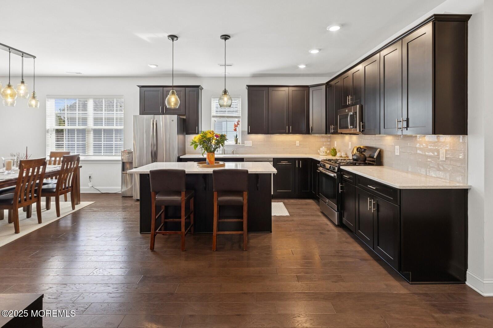60 Butler Drive Barnegat, NJ 08005 - Photo 6 of 59 a kitchen with granite countertop a sink counter top space and stainless steel appliances