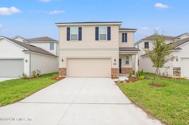 front view of house with a yard