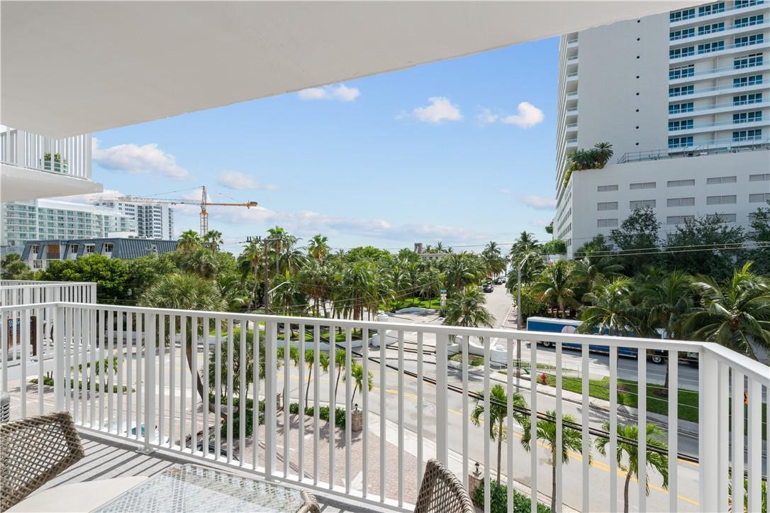 95 North Birch Road, Unit 405 Fort Lauderdale, FL 33304 - Photo 9 of 34 a view of a building from a balcony