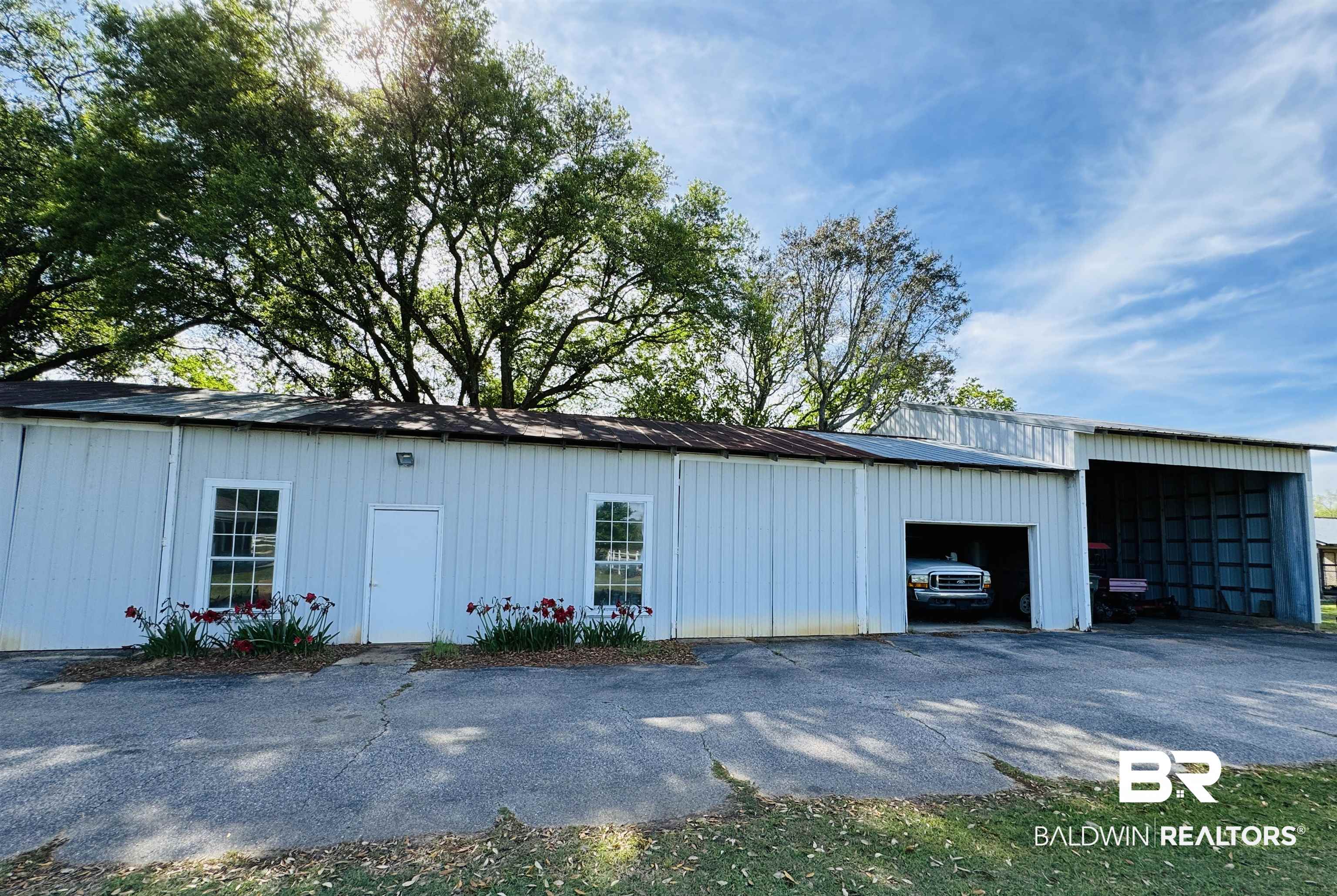 13795 White Road Silverhill, AL 36576 - Photo 78 of 99 View of pole building featuring driveway and a carport
