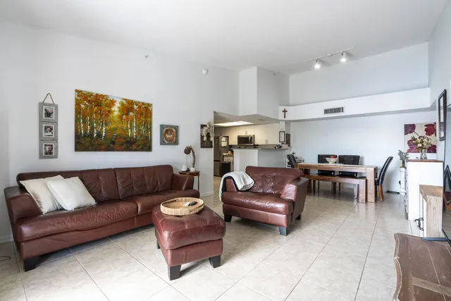a view of a balcony with furniture