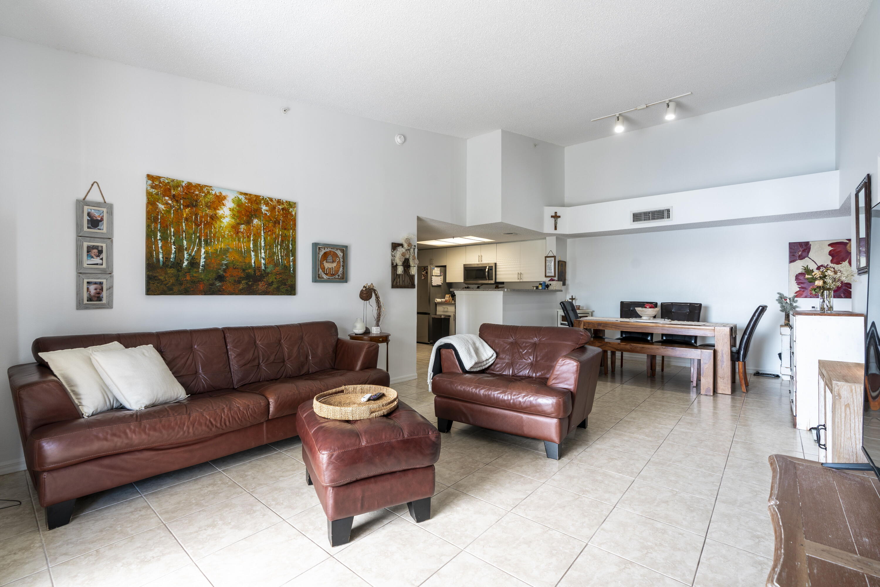 5031 Wiles Road, Unit 304 Coconut Creek, FL 33073 - Photo 16 of 55 a living room with furniture