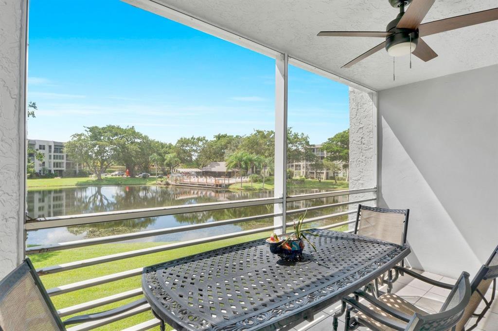 9330 Lagoon Place, Unit 209 Davie, FL 33324 - Photo 10 of 14 a room with a large window