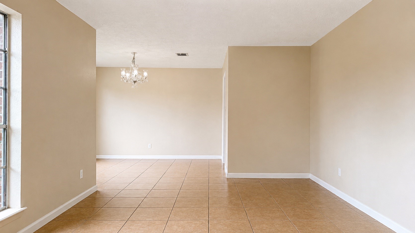 4418 Ponca Street Pasadena, TX 77504 - Photo 4 of 23 Defined dining space with clean lines and room for daily meals. (image has been enhance for marketing purposes)