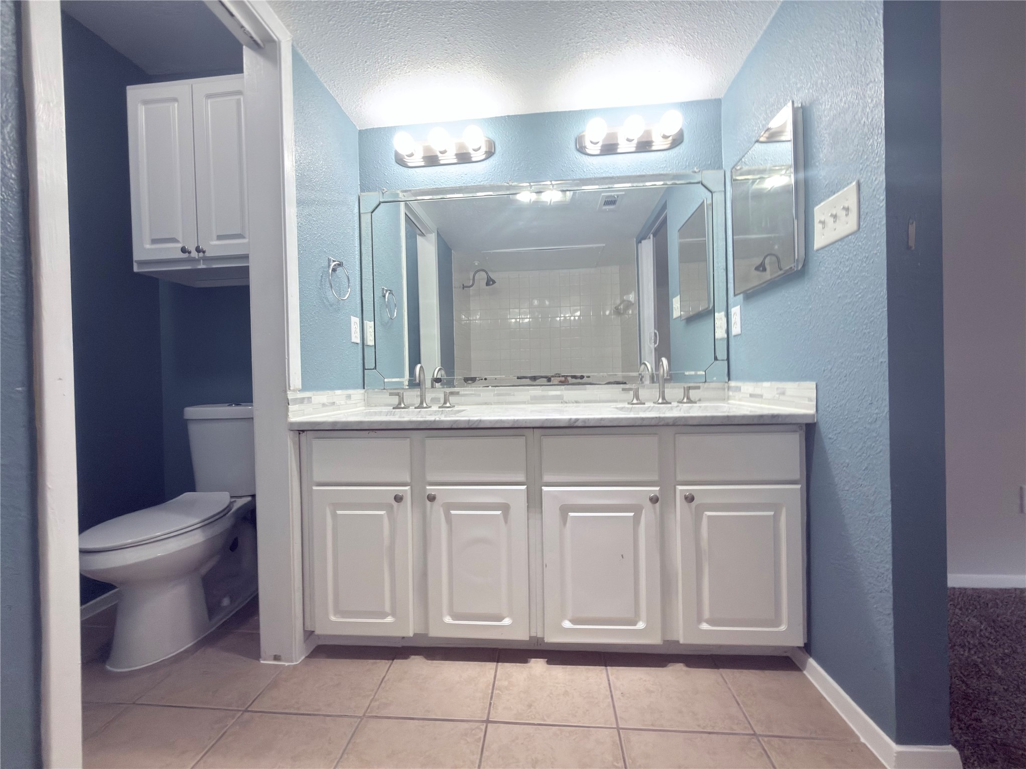 2018 West Rundberg Lane, Unit 6A Austin, TX 78758 - Photo 15 of 16 Main Bathroom. Double vanity with ample counter space and storage in this full bathroom.