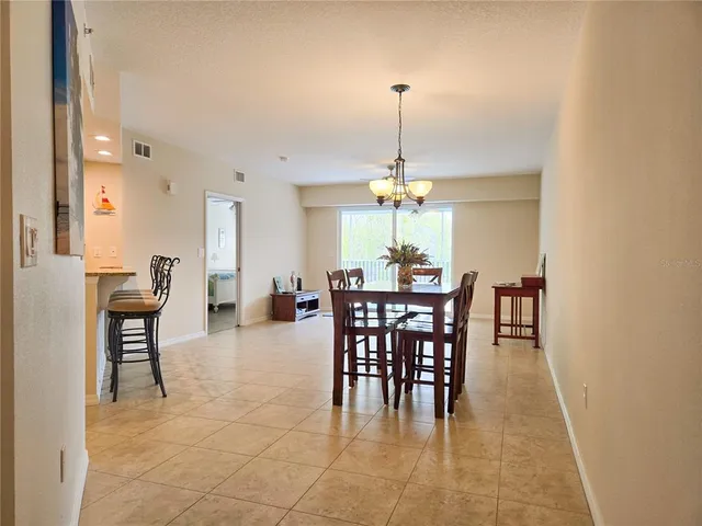 a view of balcony with wooden floor and fence