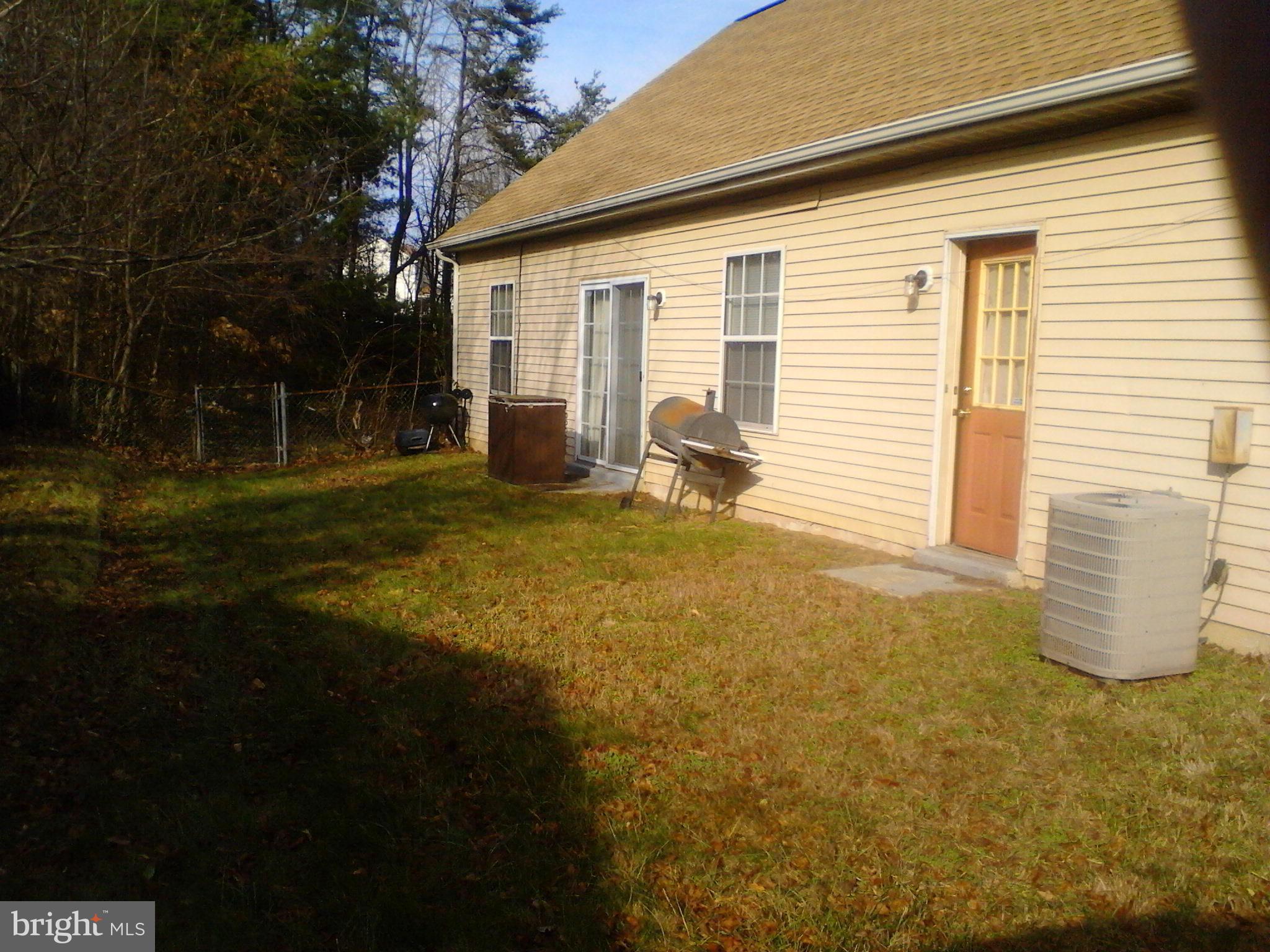 7600 Fox Hunt Court Clinton, MD 20735 - Photo 13 of 13 a view of a house with backyard