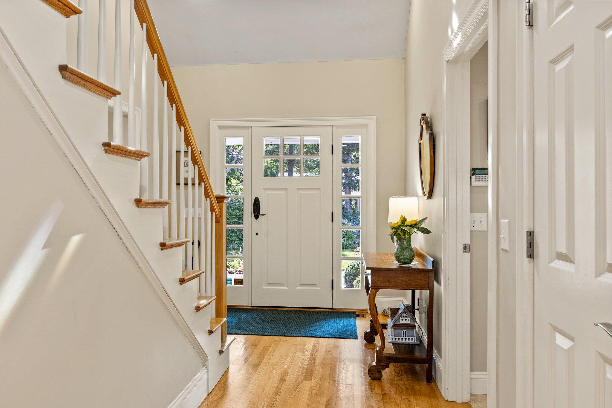 35 Angus Way Centerville, MA 02632 - Photo 15 of 62 a view of a livingroom with wooden floor and stairs
