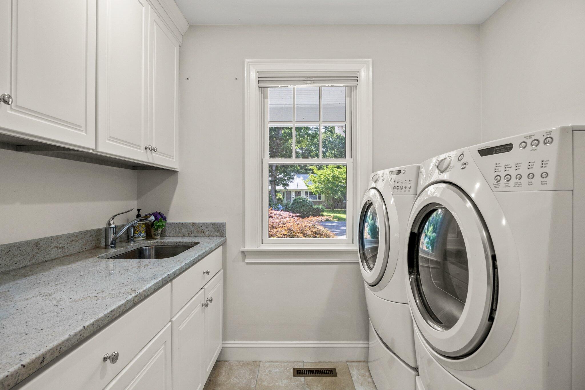 35 Angus Way Centerville, MA 02632 - Photo 16 of 62 a utility room with dryer and washer