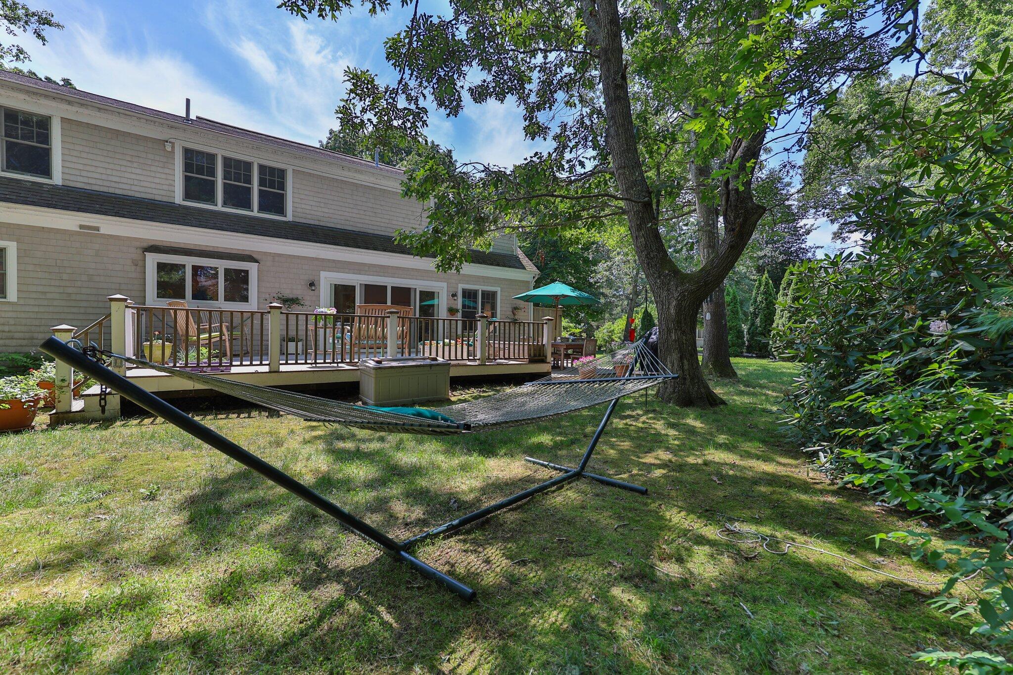 35 Angus Way Centerville, MA 02632 - Photo 44 of 62 a view of a house with swimming pool next to a big yard