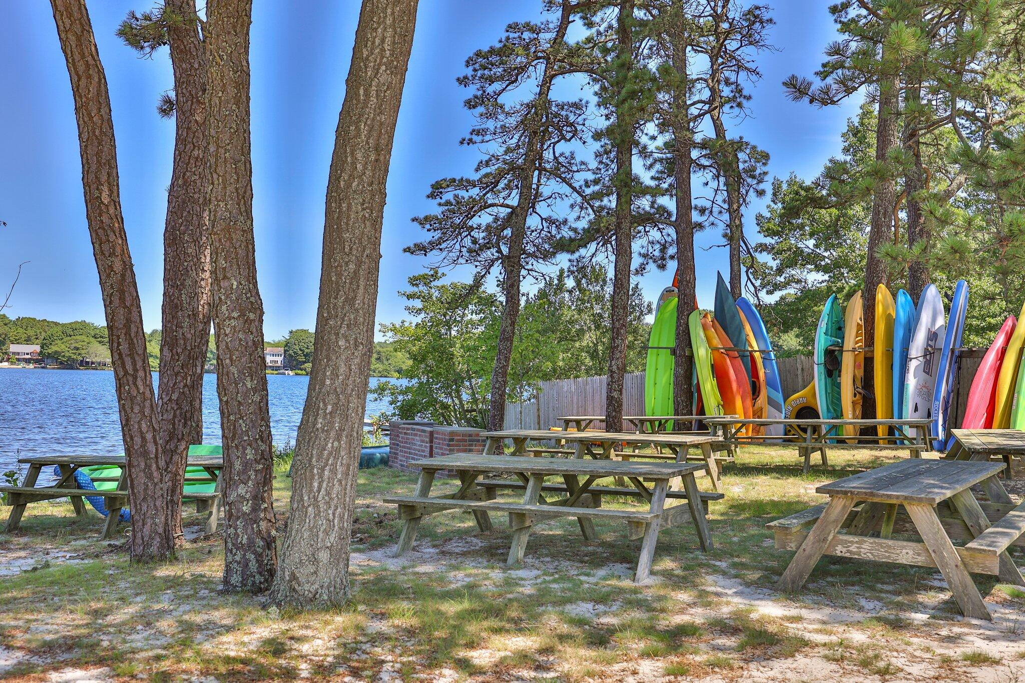 35 Angus Way Centerville, MA 02632 - Photo 49 of 62 a view of swimming pool with lawn chairs and plants