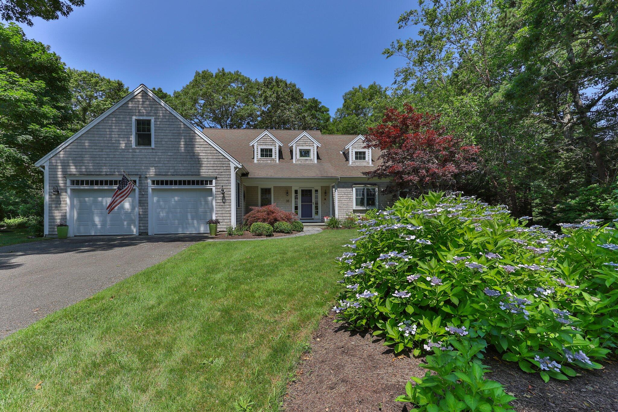 35 Angus Way Centerville, MA 02632 - Photo 54 of 62 a front view of a house with a yard