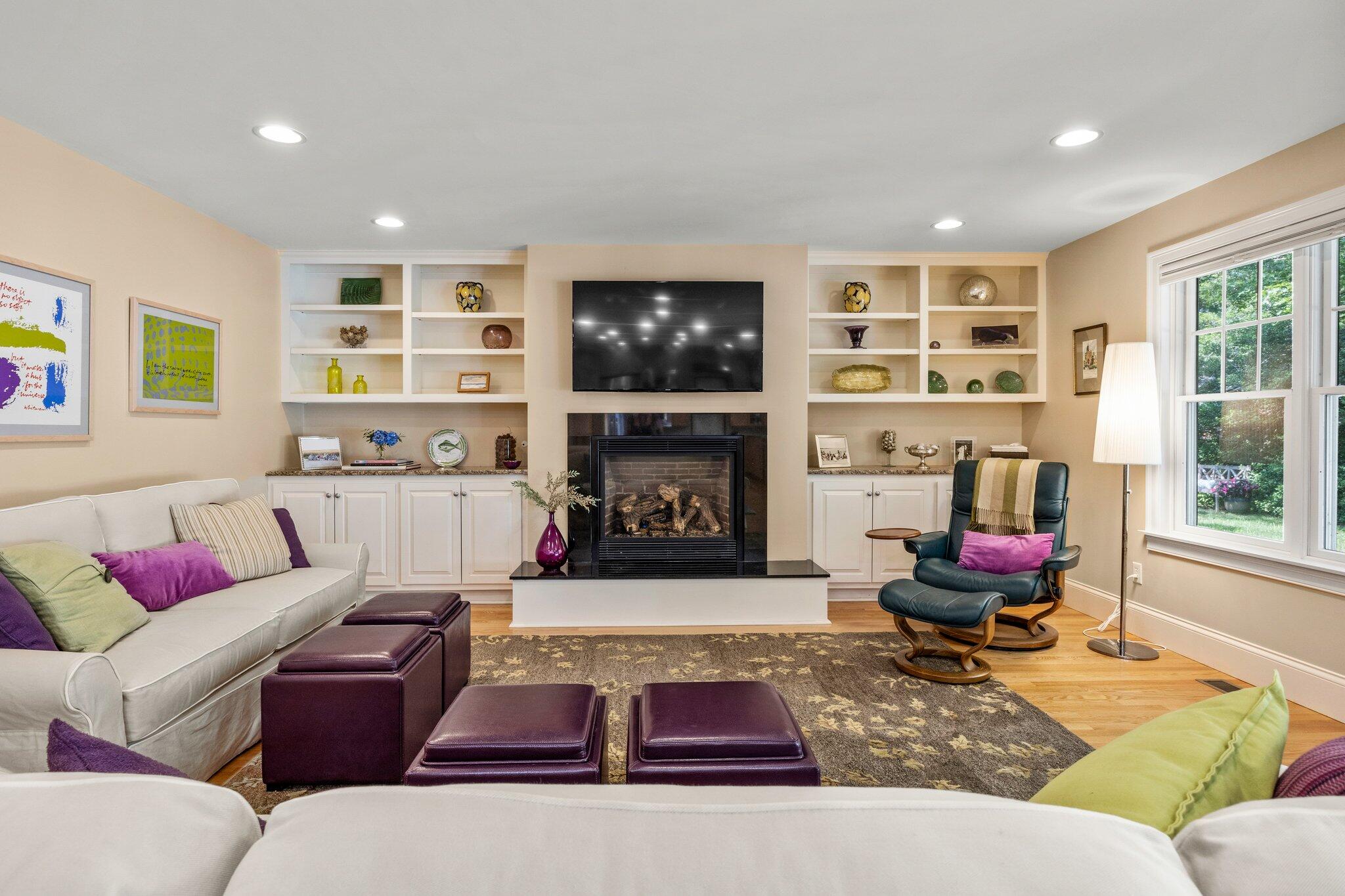 35 Angus Way Centerville, MA 02632 - Photo 6 of 62 a living room with furniture fireplace and flat screen tv