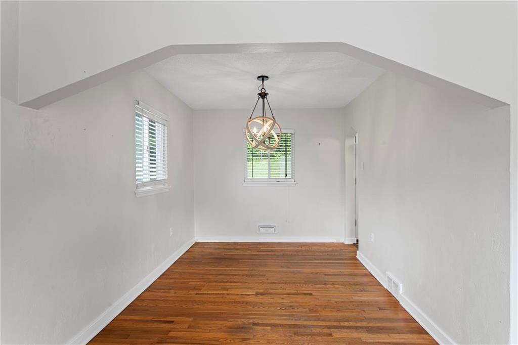 334 Shaler Street Pittsburgh, PA 15211 - Photo 16 of 31 a view of empty room with wooden floor and fan