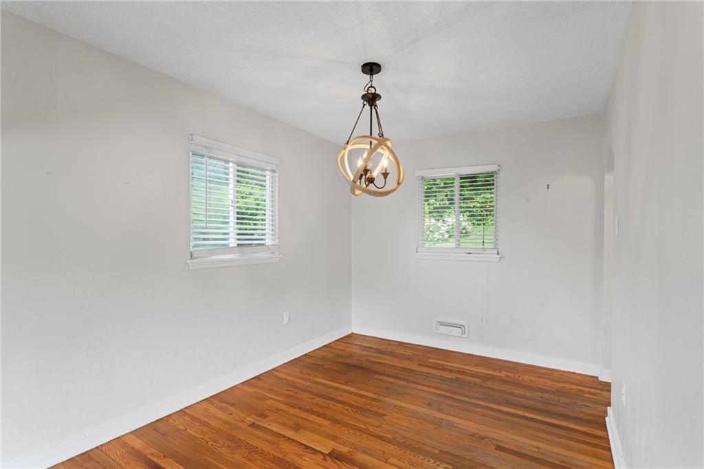 334 Shaler Street Pittsburgh, PA 15211 - Photo 17 of 31 a view of empty room with wooden floor and fan