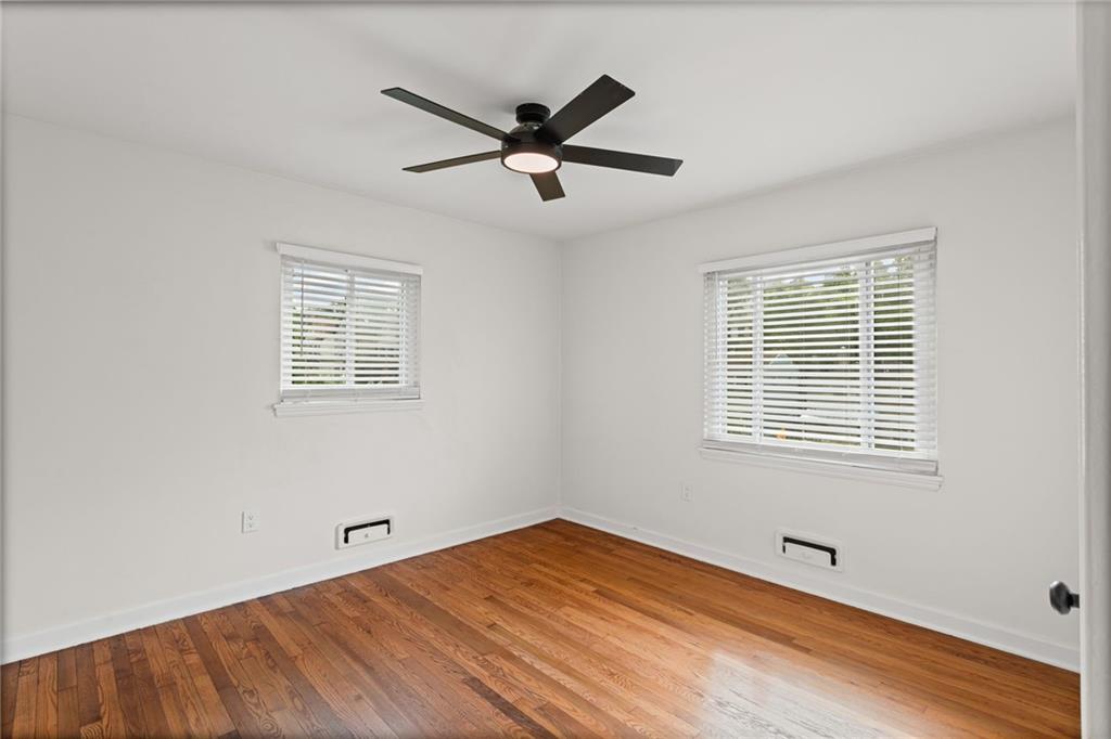 334 Shaler Street Pittsburgh, PA 15211 - Photo 21 of 31 a view of empty room with wooden floor and fan