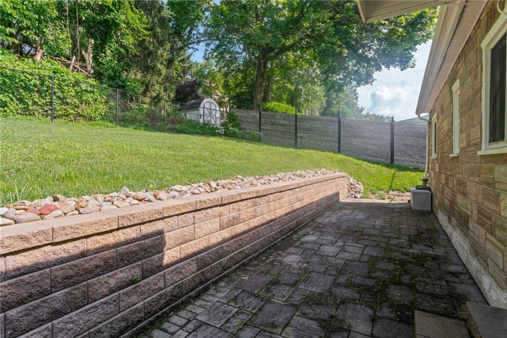 334 Shaler Street Pittsburgh, PA 15211 - Photo 28 of 31 a view of a backyard with wooden fence