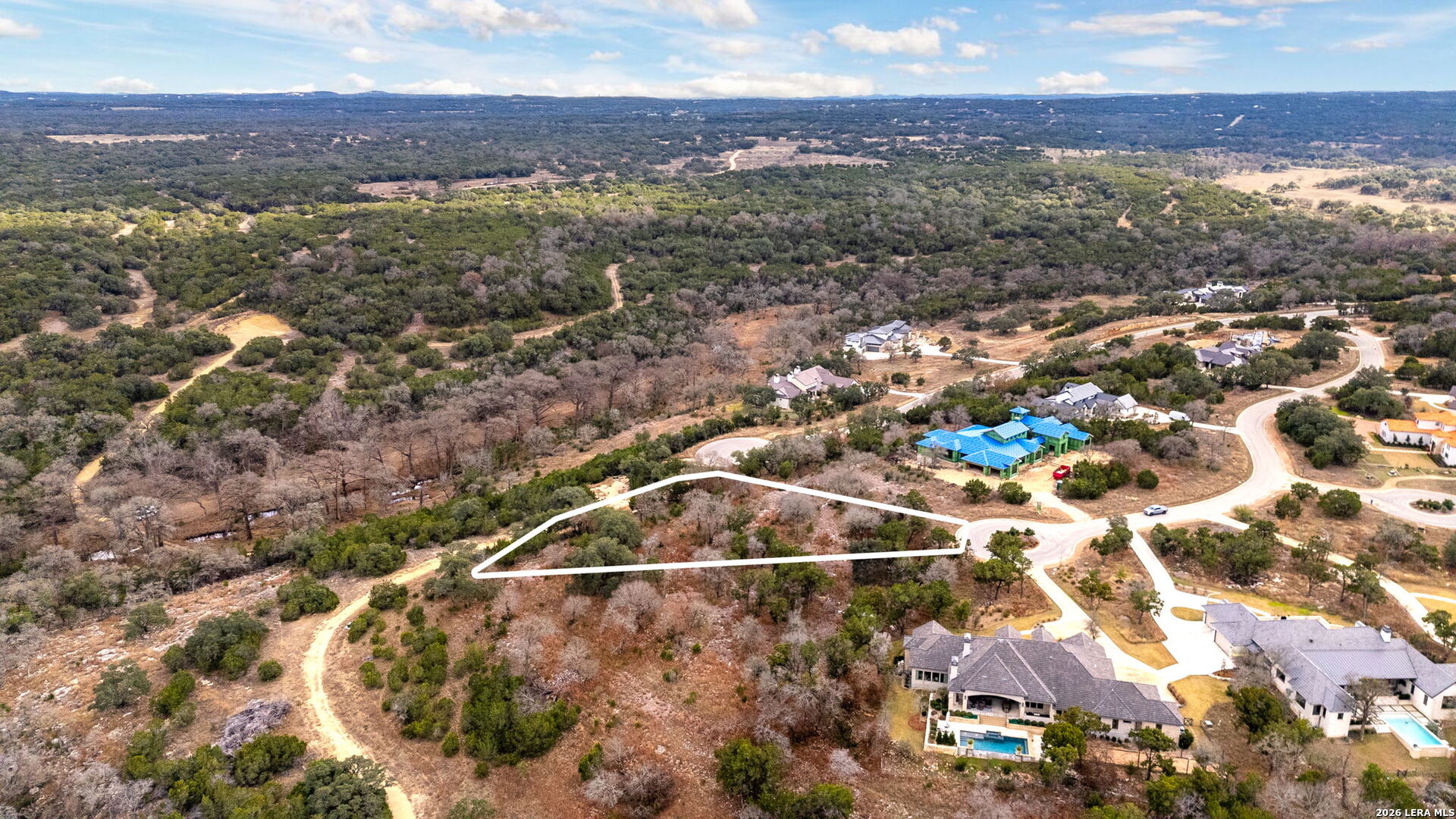 Lot 12 Landmark Ridge Bergheim, TX 78004 - Photo 3 of 16 a view of a city with sunset view