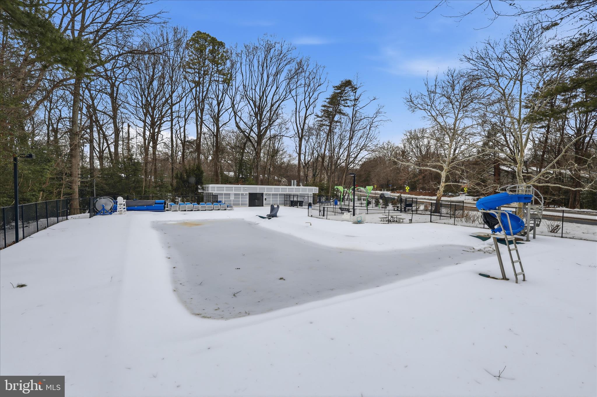 2255 Castle Rock Square, Unit 21C Reston, VA 20191 - Photo 28 of 33 a view of outdoor space with swings and slides