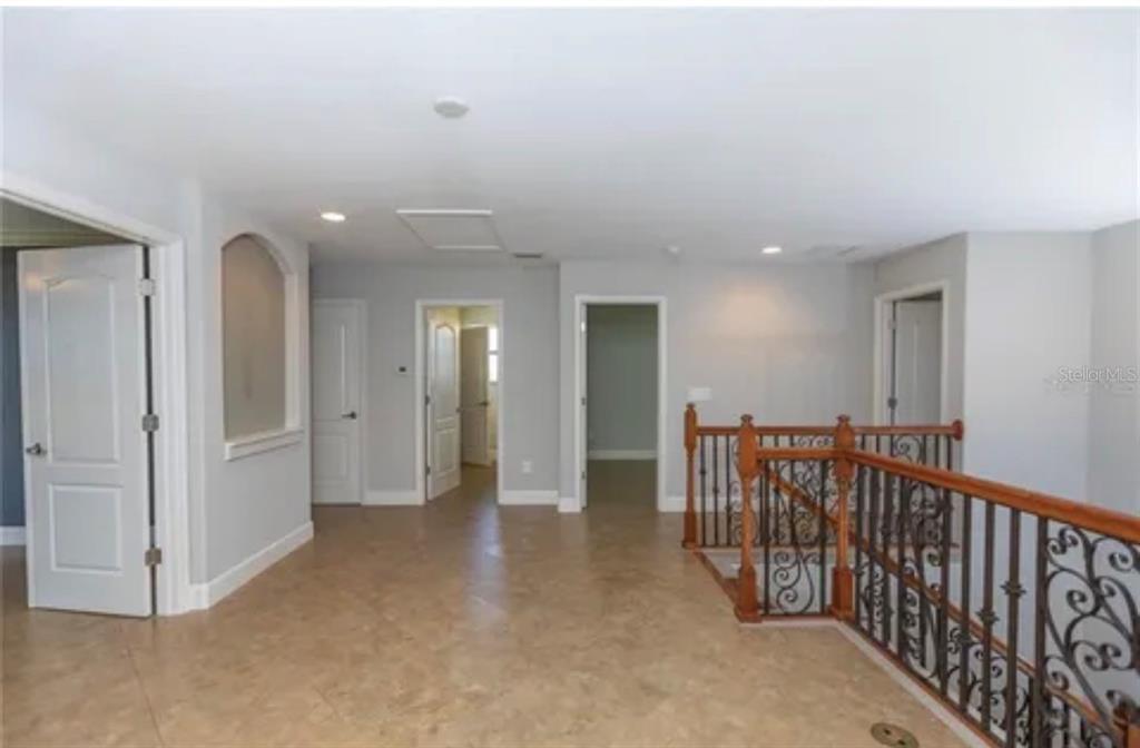 6914 Quiet Creek Drive Bradenton, FL 34212 - Photo 17 of 31 a view of a hallway with closet area