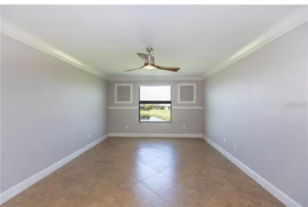 6914 Quiet Creek Drive Bradenton, FL 34212 - Photo 23 of 31 an empty room that has a window