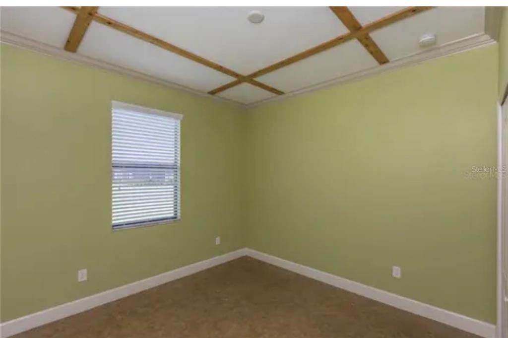 6914 Quiet Creek Drive Bradenton, FL 34212 - Photo 31 of 31 a view of a room that has a window